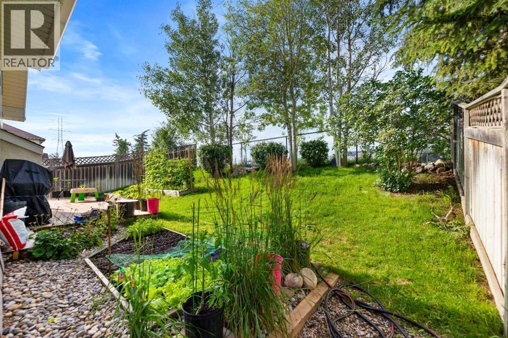 Photo 29 of 250 Strathridge Place Sw, Calgary AB