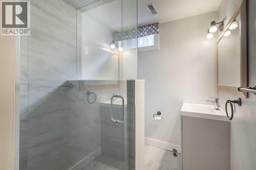 Single Family House 4 Level for Sale in  Lake Rosen Crescent SE Lake Bonavista Calgary 