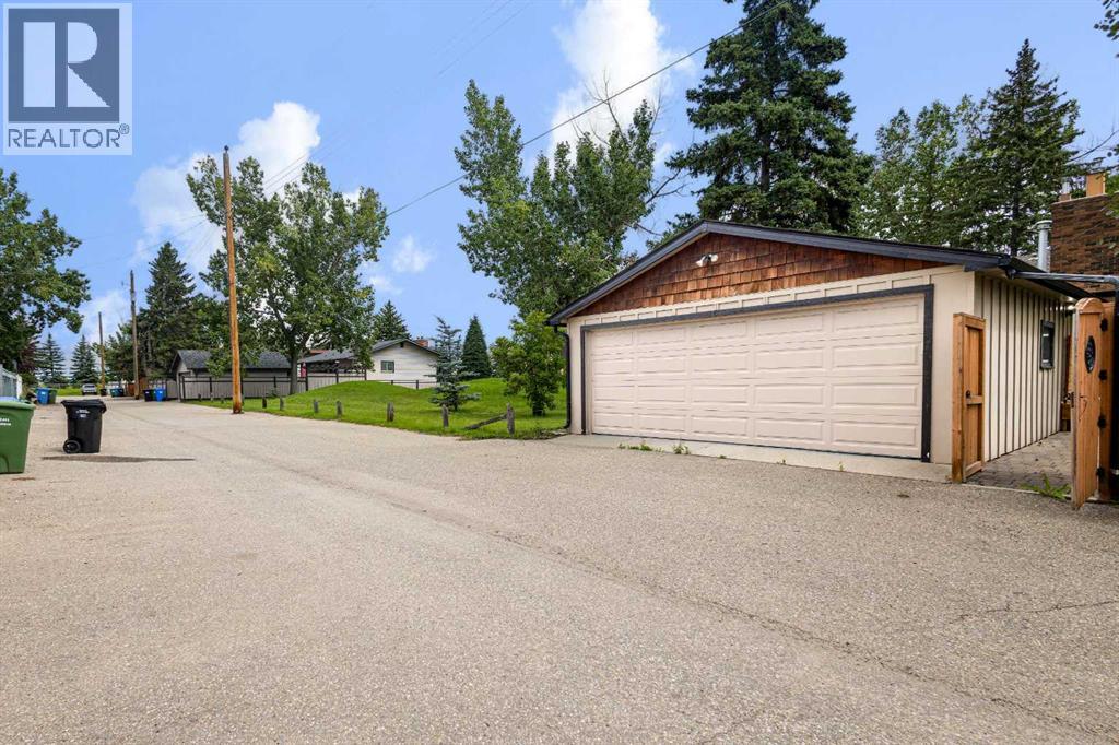 Single Family House 4 Level for Sale in  Lake Rosen Crescent SE Lake Bonavista Calgary 