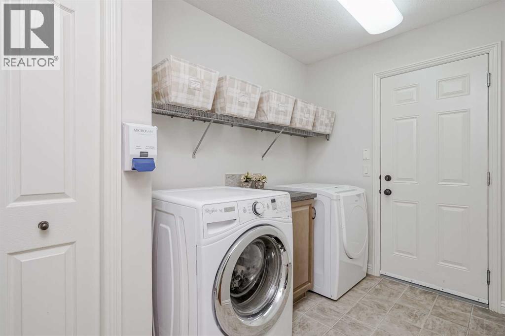 Single Family House for Sale in  Everwillow Park SW Evergreen Calgary 