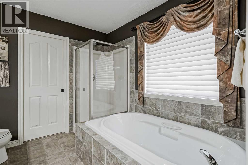 Single Family House for Sale in  Everwillow Park SW Evergreen Calgary 