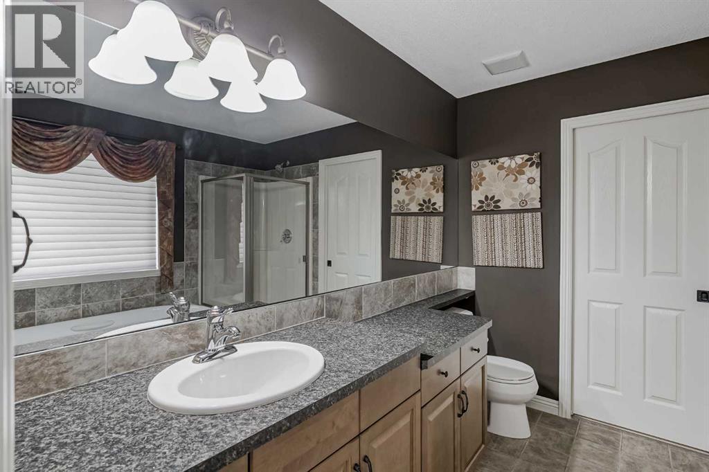 Single Family House for Sale in  Everwillow Park SW Evergreen Calgary 