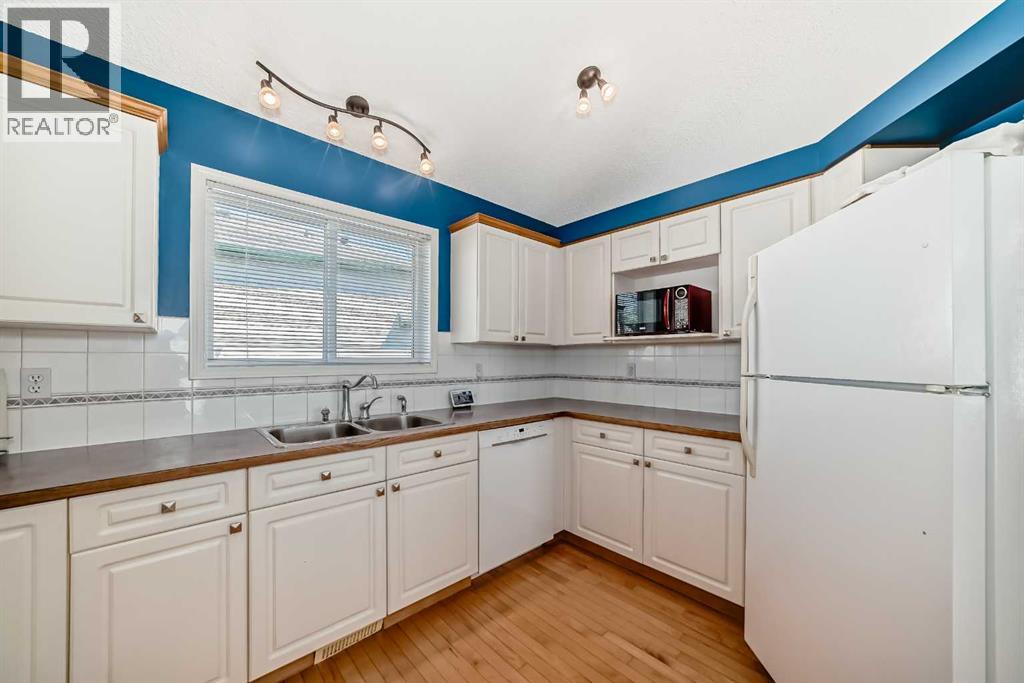 Single Family House 4 Level for Sale in  Harvest Rose Place NE Harvest Hills Calgary 