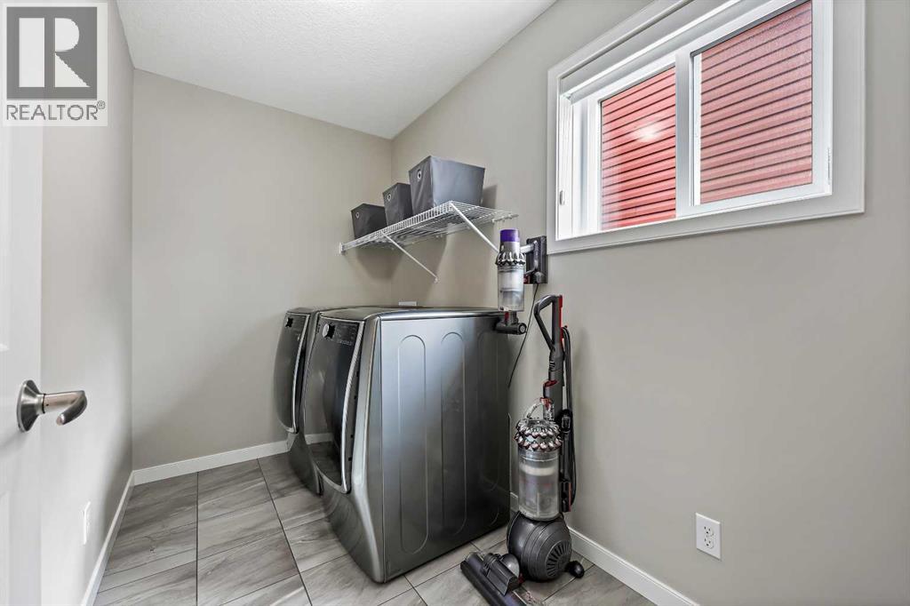 Photo 39 of 127 Fireside Crescent, Cochrane AB