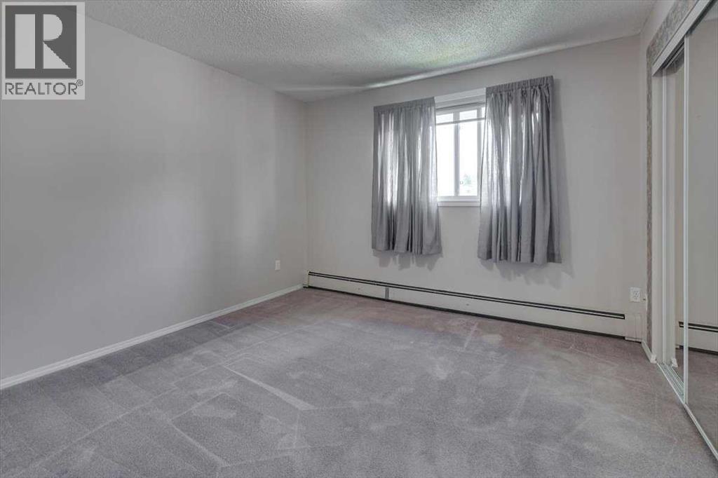 Photo 16 of 312 5330 47 Avenue, Red Deer AB