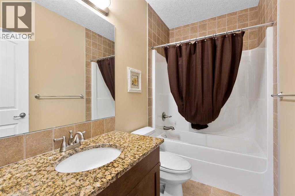Photo 32 of 117 Kingsland Court Se, Airdrie AB