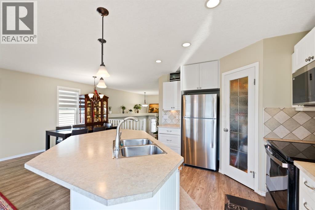 Single Family House Bi-level for Sale in  Covebrook Close NE Coventry Hills Calgary 