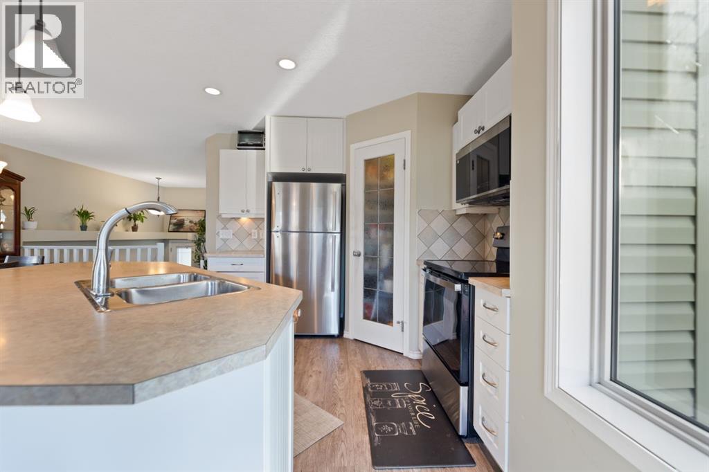 Single Family House Bi-level for Sale in  Covebrook Close NE Coventry Hills Calgary 
