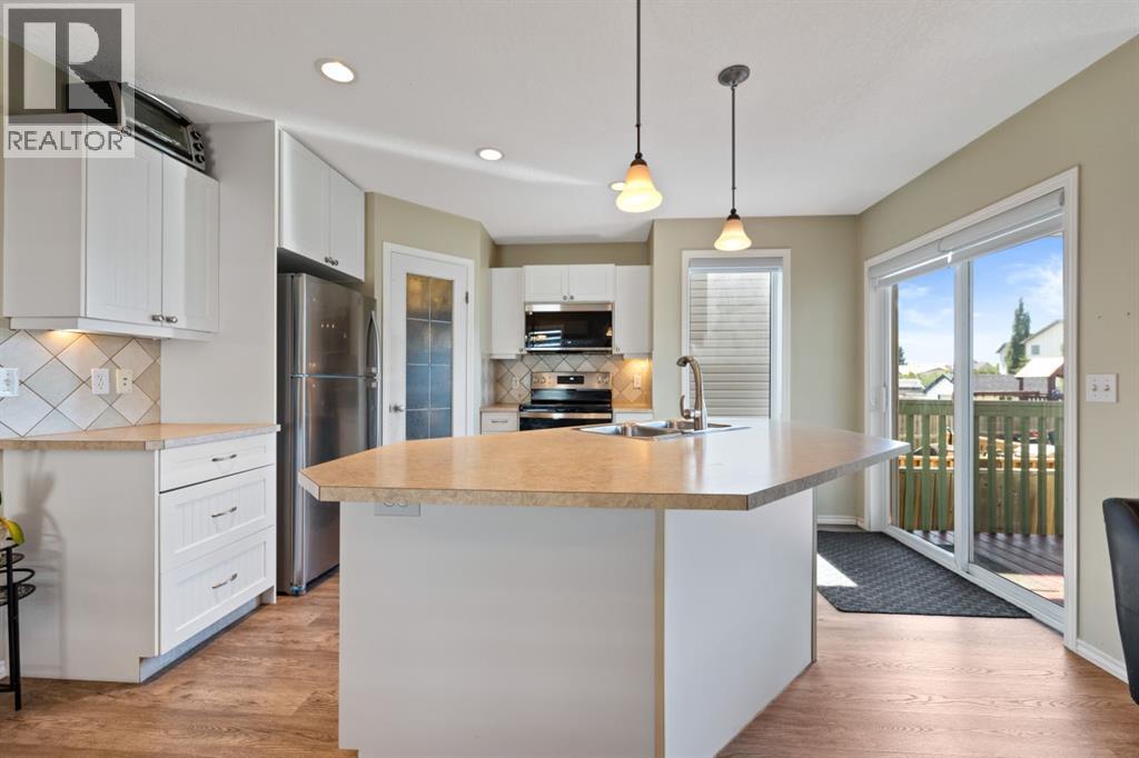 Single Family House Bi-level for Sale in  Covebrook Close NE Coventry Hills Calgary 