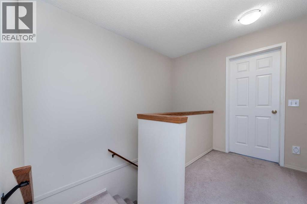 Single Family House for Sale in  Christie Park Mews SW Christie Park Calgary 