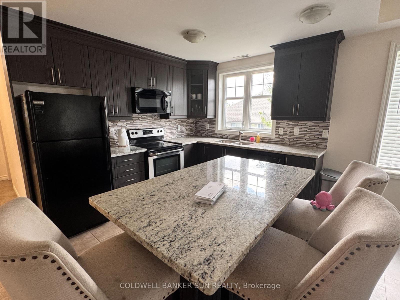 Photo 15 of 211 2 Colonial Drive, Guelph ON