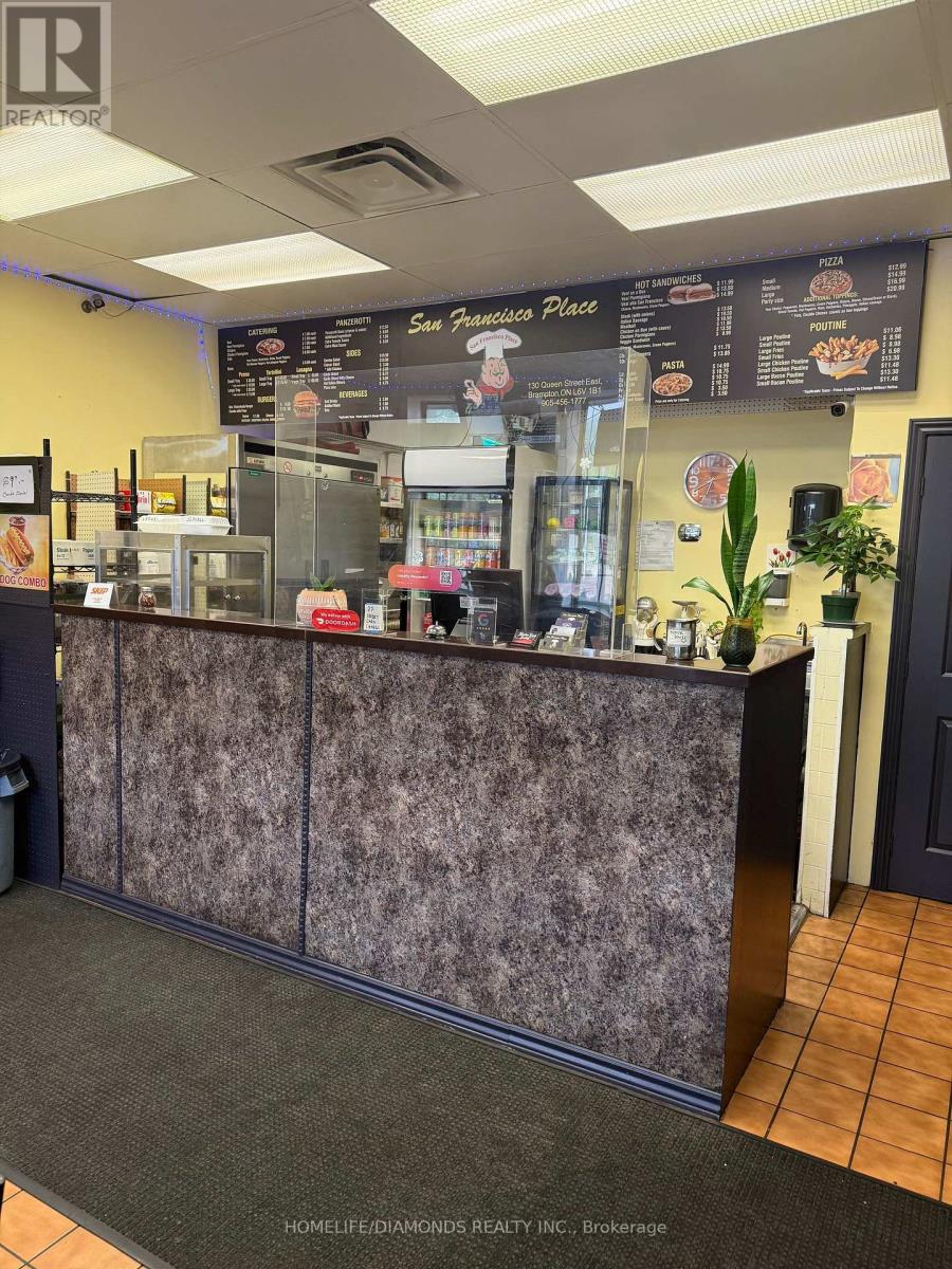 Photo 2 of 4 130 Queen Street E, Brampton ON