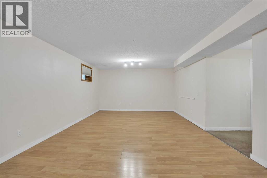 Single Family House Bi-level for Sale in  Coral Keys Drive NE Coral Springs Calgary 