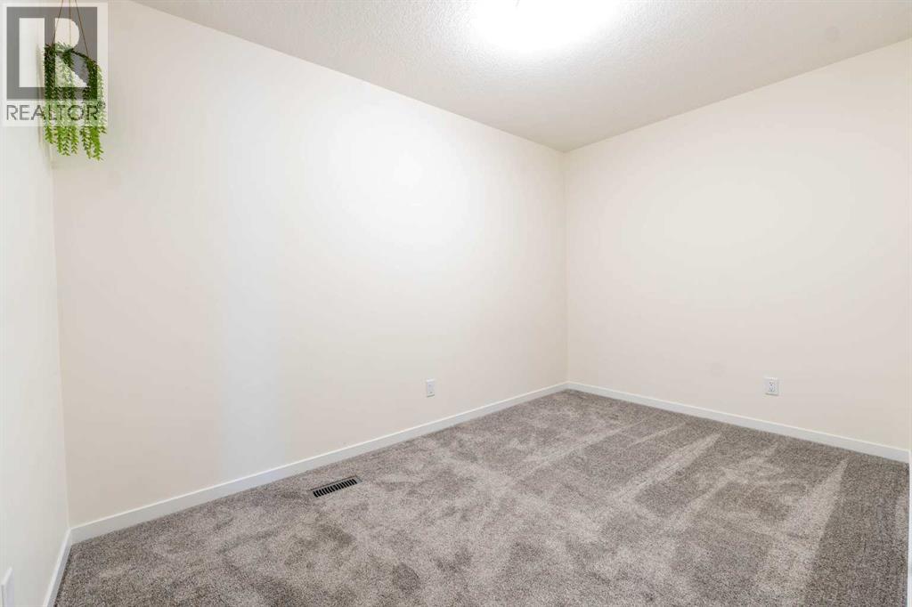 Photo 16 of 763 South Point Heath Sw, Airdrie AB