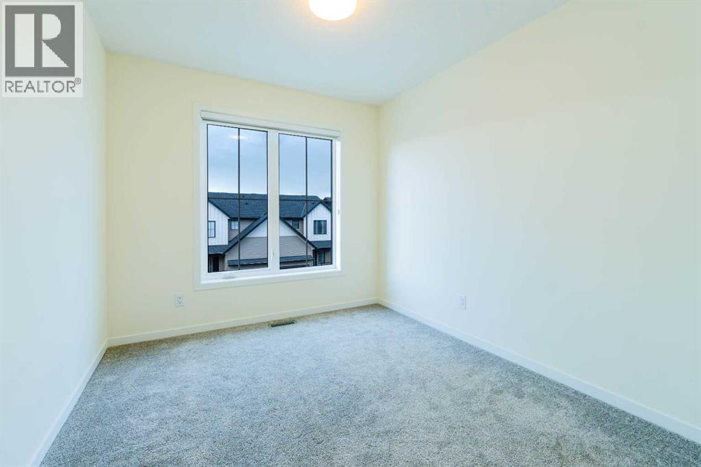 Photo 13 of 763 South Point Heath Sw, Airdrie AB