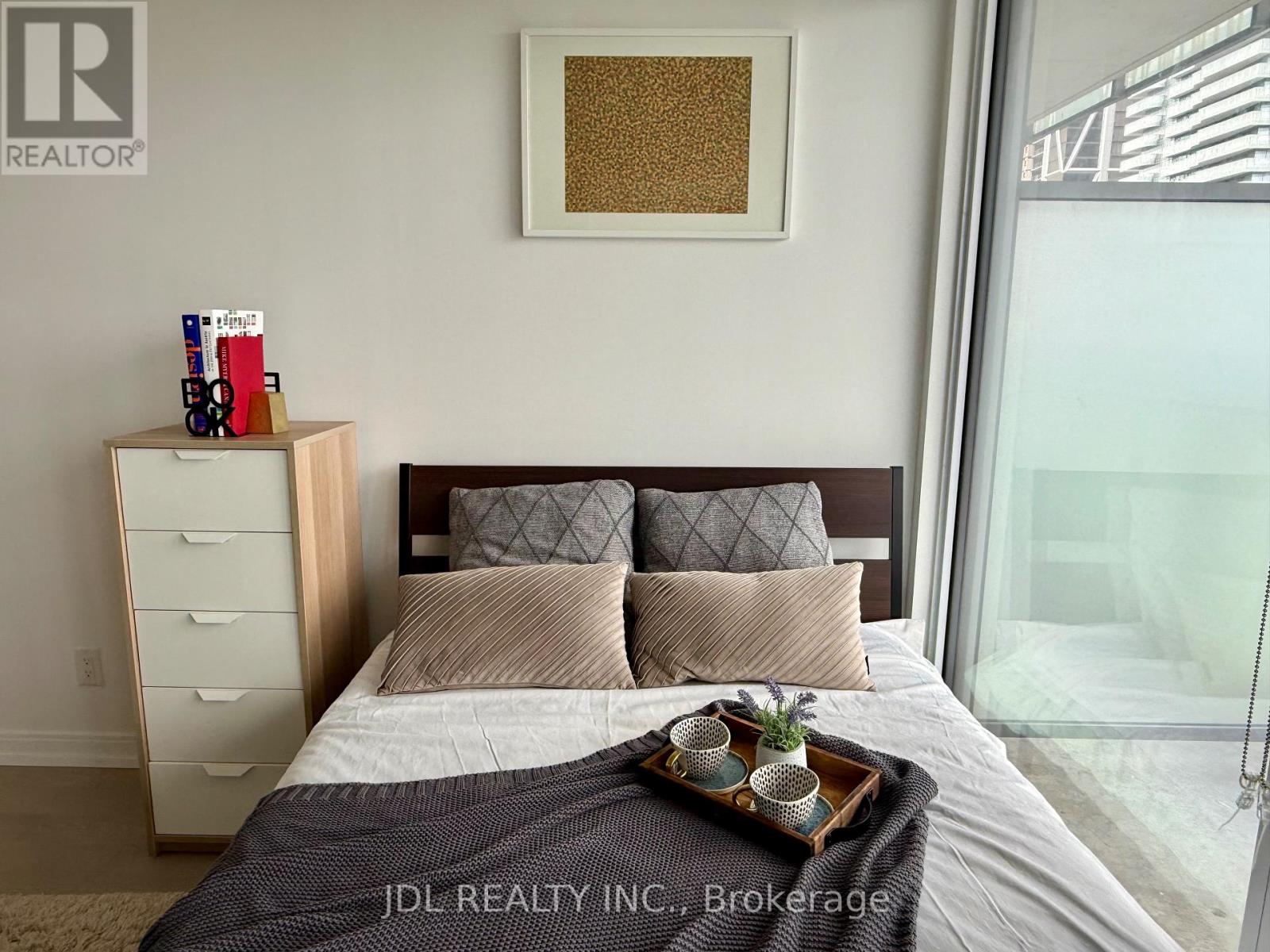 Photo 2 of 4107 42 Charles Street E, Toronto ON