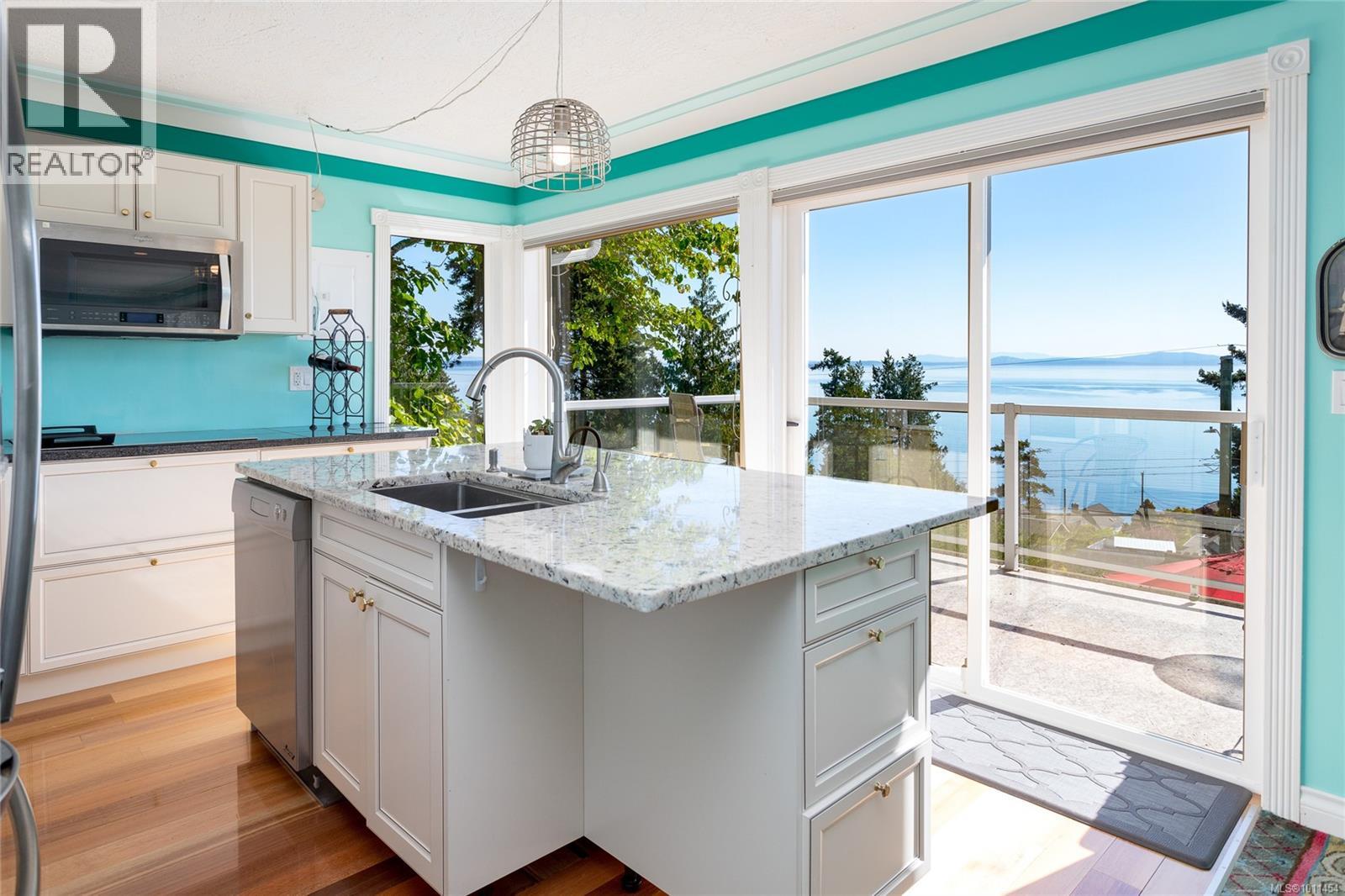 Photo 26 of 4964 Lochside Dr, Saanich BC