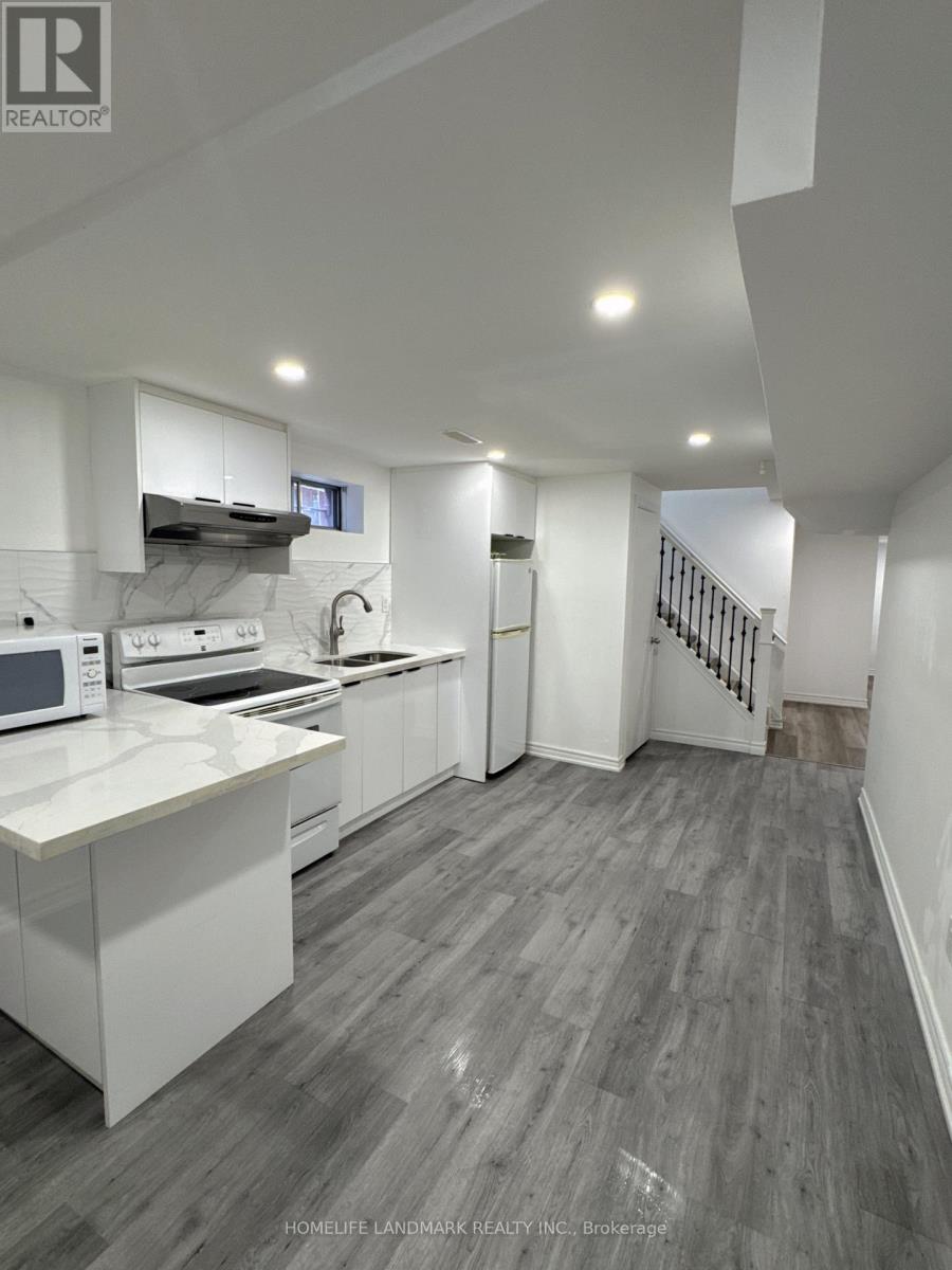Photo 13 of 104 Loganberry Crescent, Toronto ON