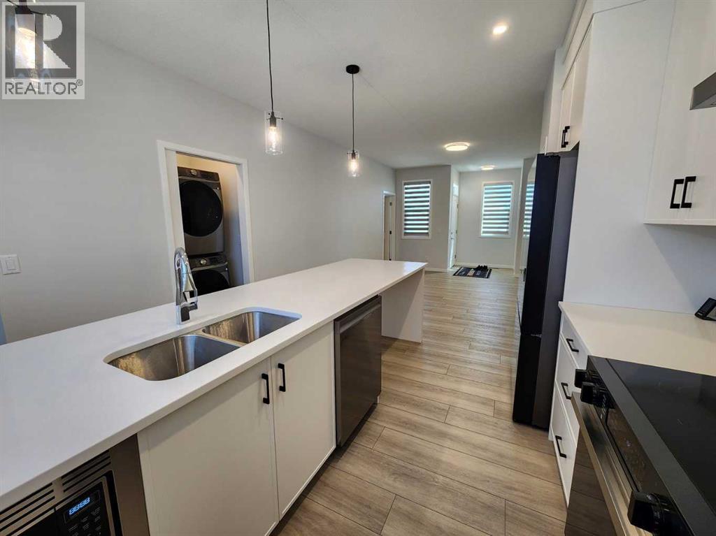 Single Family House Bungalow for Sale in  Herron Common NE Livingston Calgary 