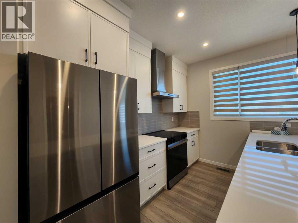 Single Family House Bungalow for Sale in  Herron Common NE Livingston Calgary 