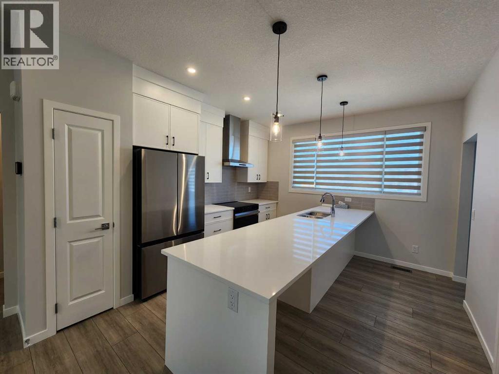 Single Family House Bungalow for Sale in  Herron Common NE Livingston Calgary 