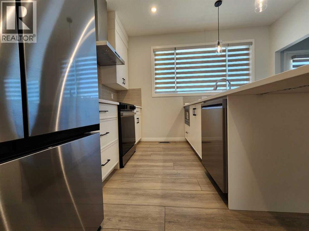 Single Family House Bungalow for Sale in  Herron Common NE Livingston Calgary 