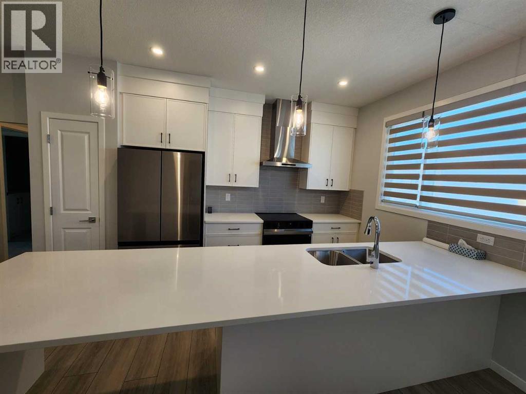 Single Family House Bungalow for Sale in  Herron Common NE Livingston Calgary 