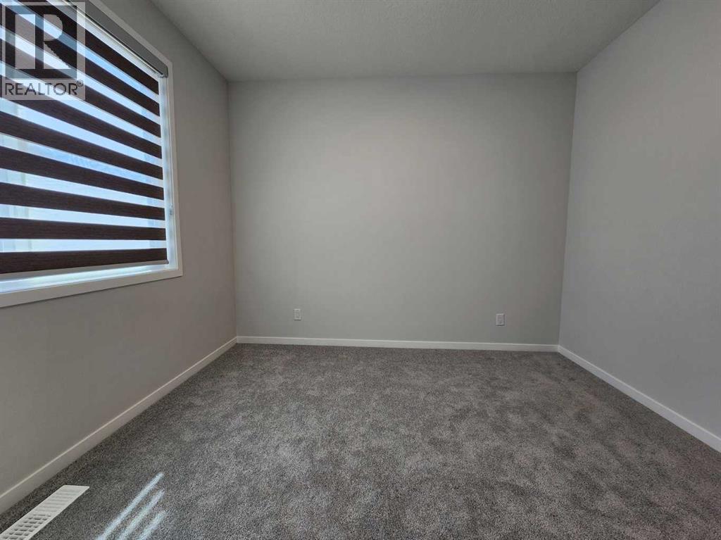 Single Family House Bungalow for Sale in  Herron Common NE Livingston Calgary 