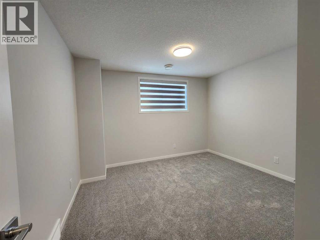 Single Family House Bungalow for Sale in  Herron Common NE Livingston Calgary 