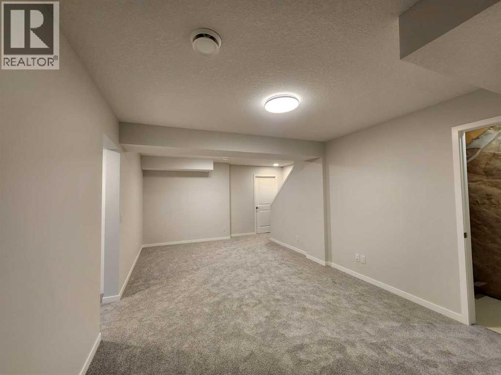 Single Family House Bungalow for Sale in  Herron Common NE Livingston Calgary 