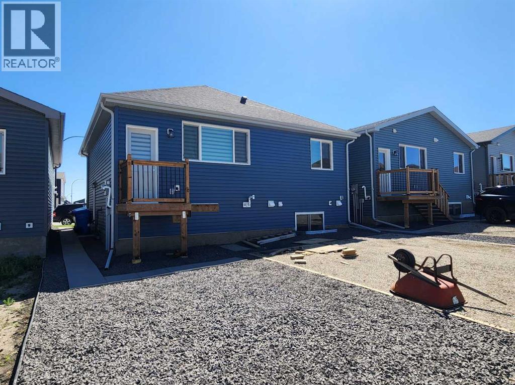Single Family House Bungalow for Sale in  Herron Common NE Livingston Calgary 