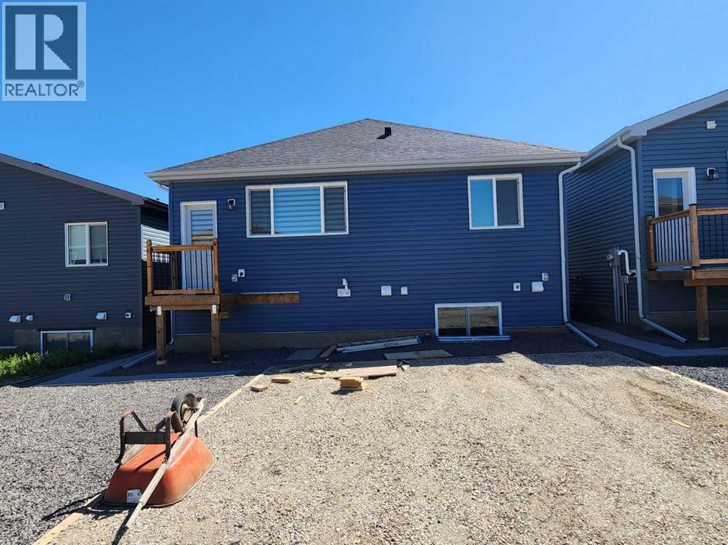 Single Family House Bungalow for Sale in  Herron Common NE Livingston Calgary 