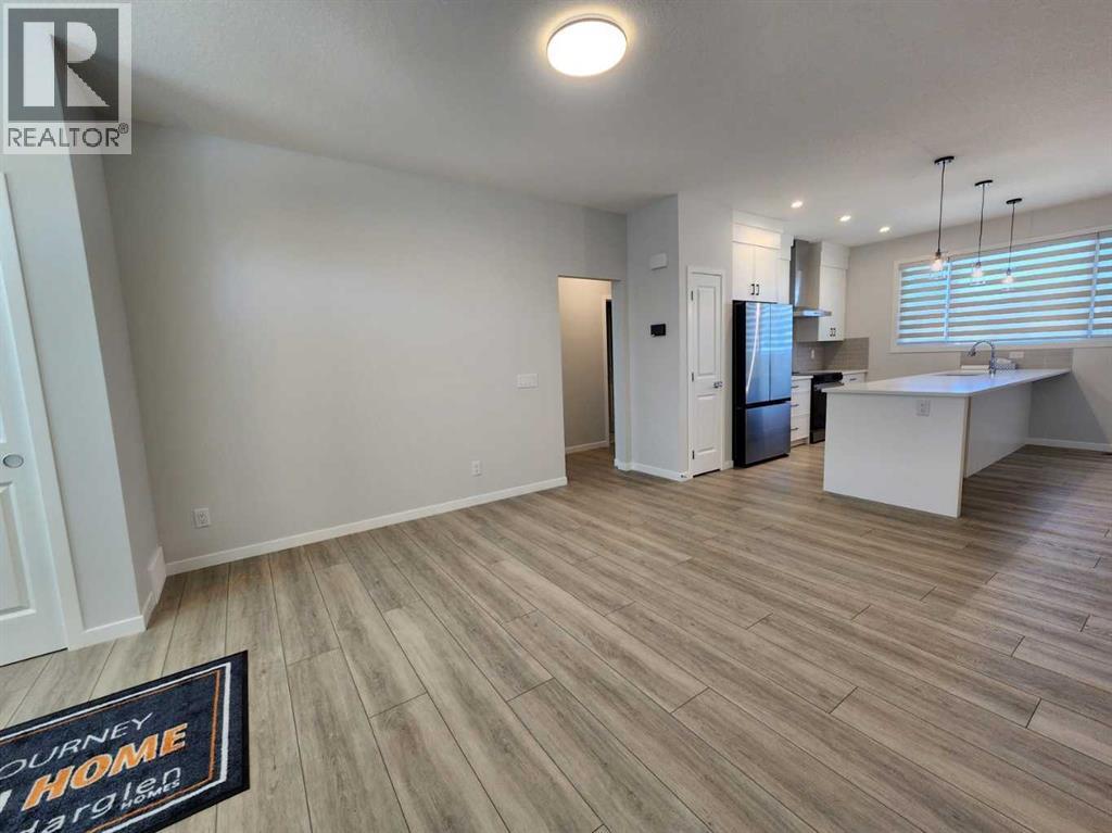 Single Family House Bungalow for Sale in  Herron Common NE Livingston Calgary 