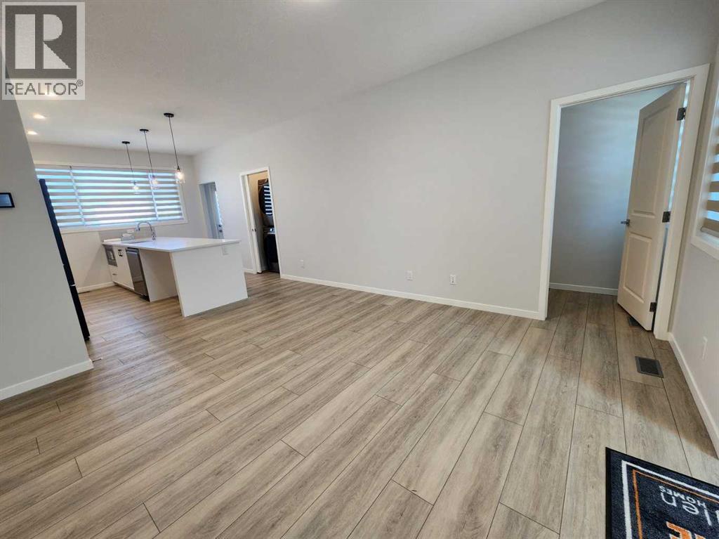 Single Family House Bungalow for Sale in  Herron Common NE Livingston Calgary 