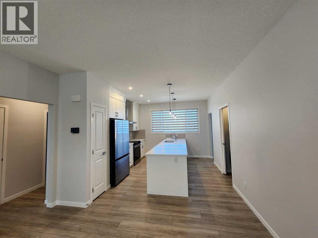Single Family House Bungalow for Sale in  Herron Common NE Livingston Calgary 