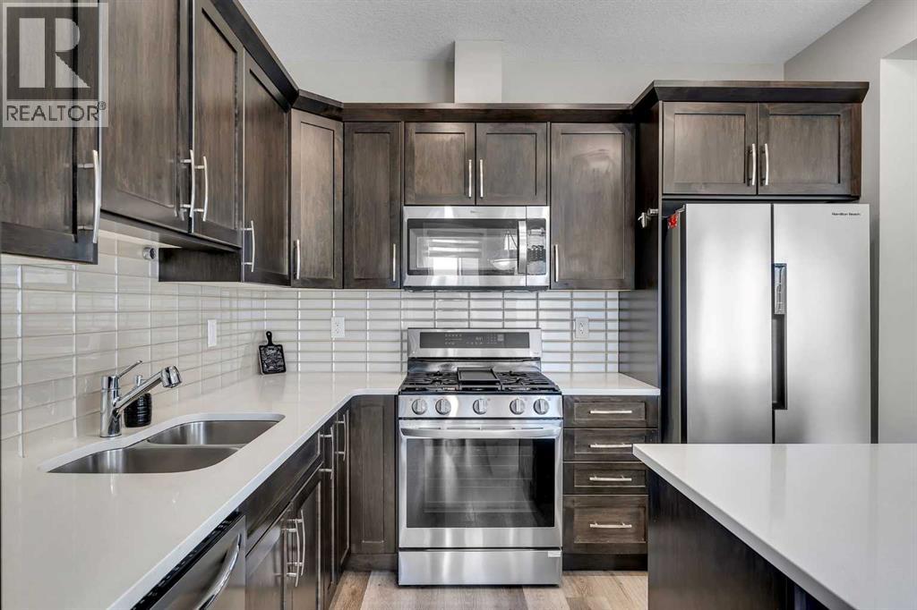 Photo 10 of 78 Osborne Common Sw, Airdrie AB