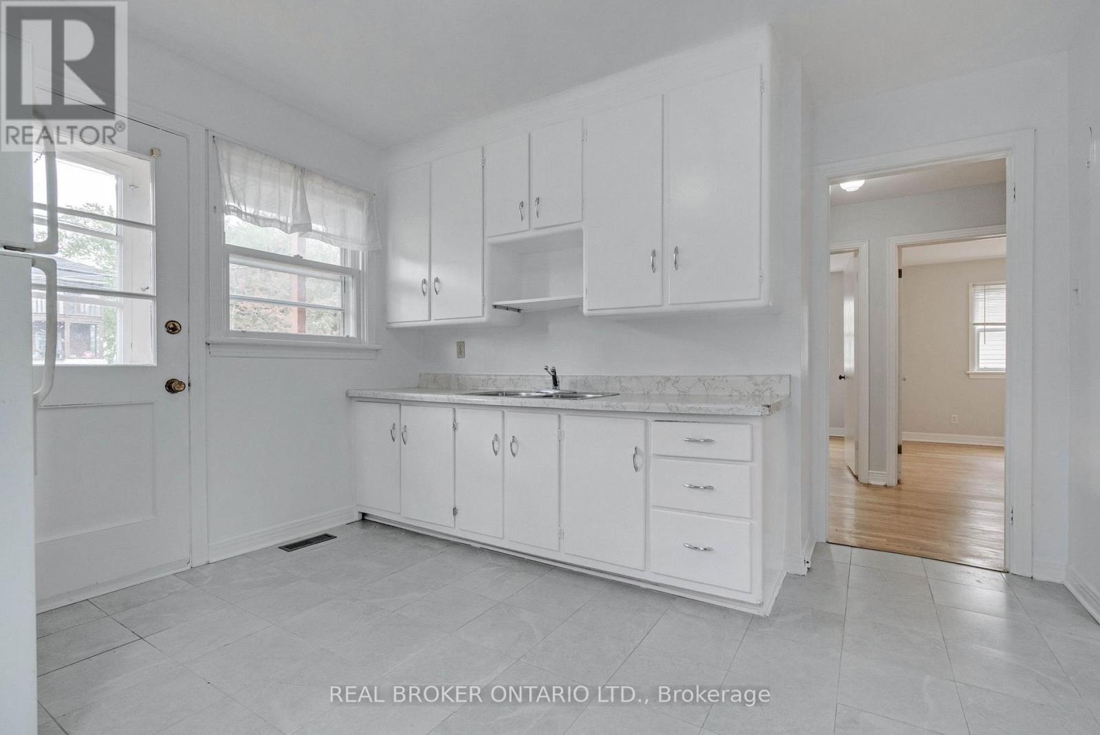 Kitchen with Door to Deck and Yard