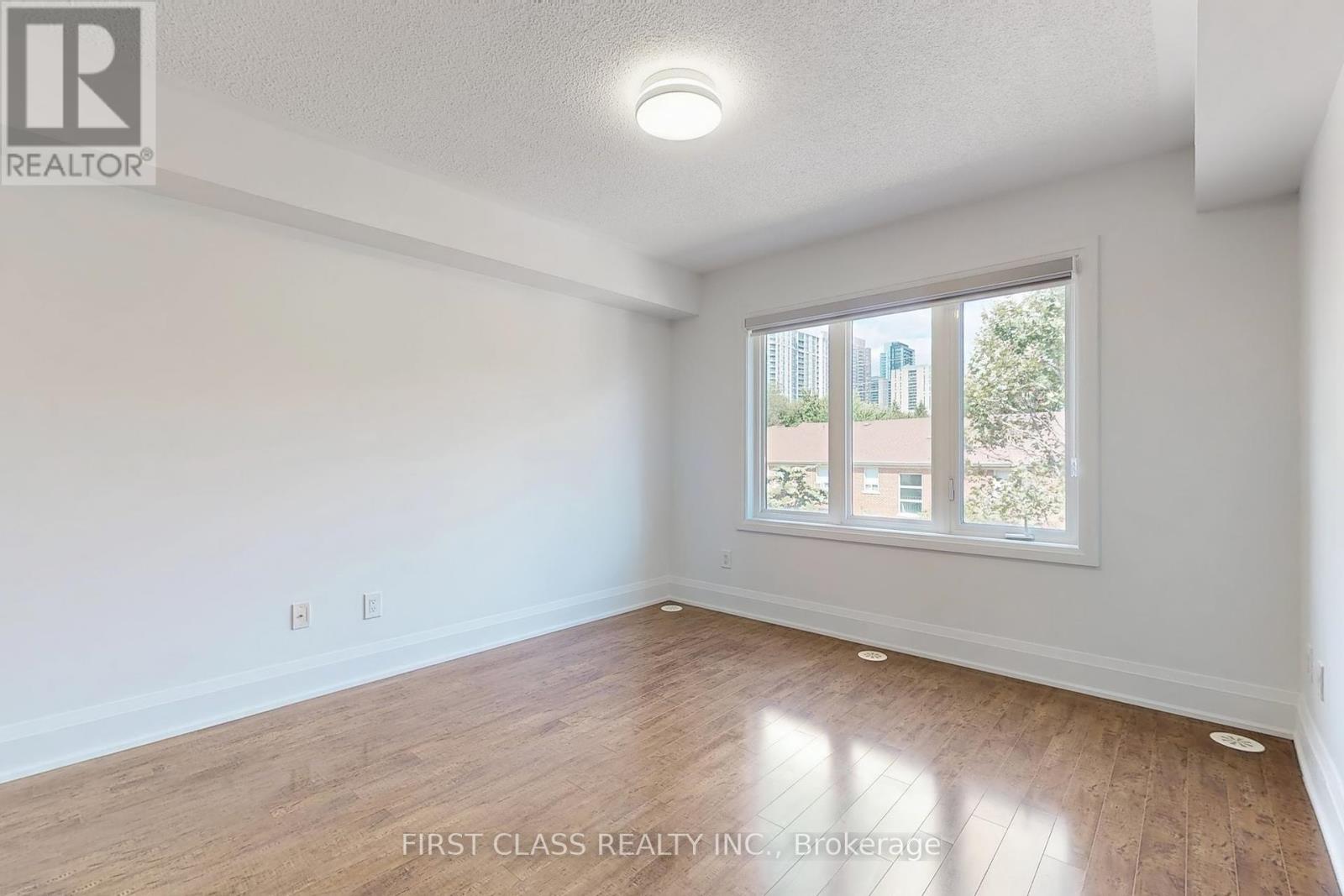 Photo 27 of Th 28 9 Oakburn Crescent, Toronto ON