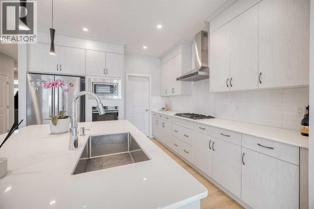 Single Family House for Sale in  Ambleside Crescent NW Moraine Calgary 