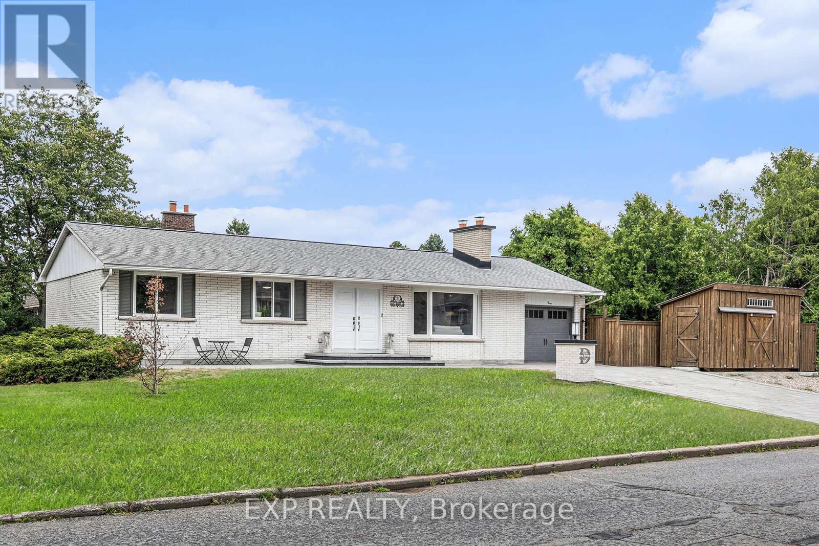 Driveway fits 4 cars! + Spacious wooden shed