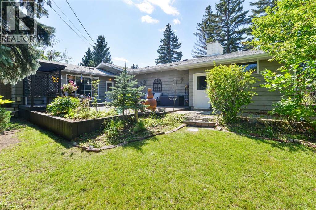 Single Family House Bungalow for Sale in  Laurentian Way SW North Glenmore Park Calgary 