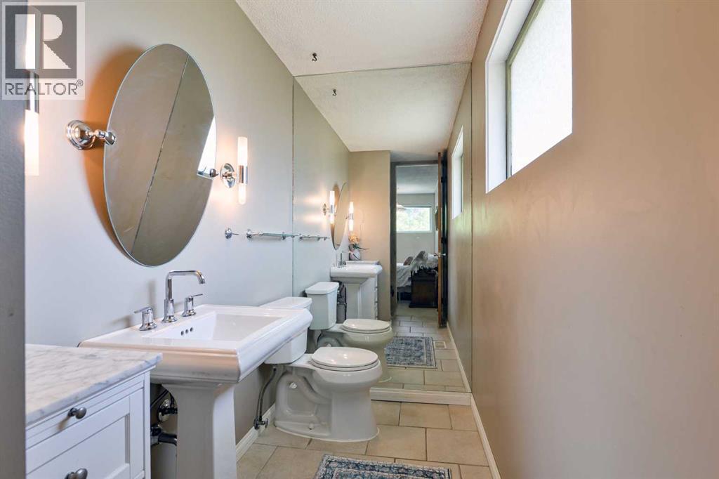 Single Family House Bungalow for Sale in  Laurentian Way SW North Glenmore Park Calgary 