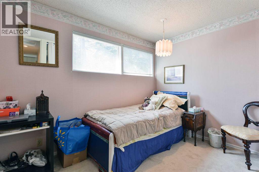 Single Family House Bungalow for Sale in  Laurentian Way SW North Glenmore Park Calgary 