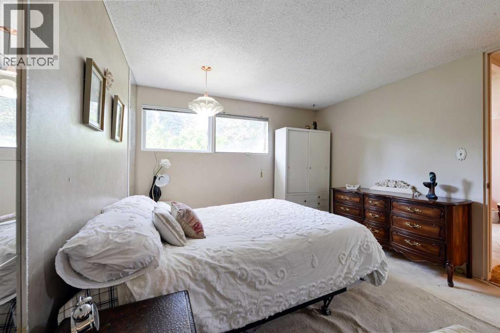 Single Family House Bungalow for Sale in  Laurentian Way SW North Glenmore Park Calgary 