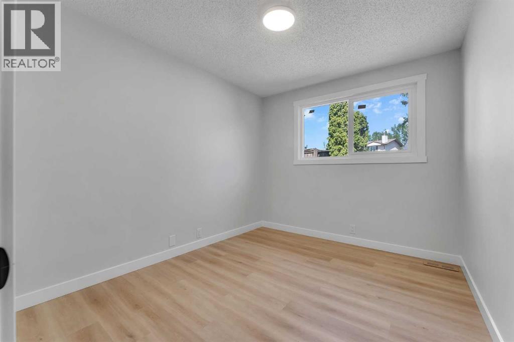 Single Family House 4 Level for Sale in  Ranchview Road NW Ranchlands Calgary 