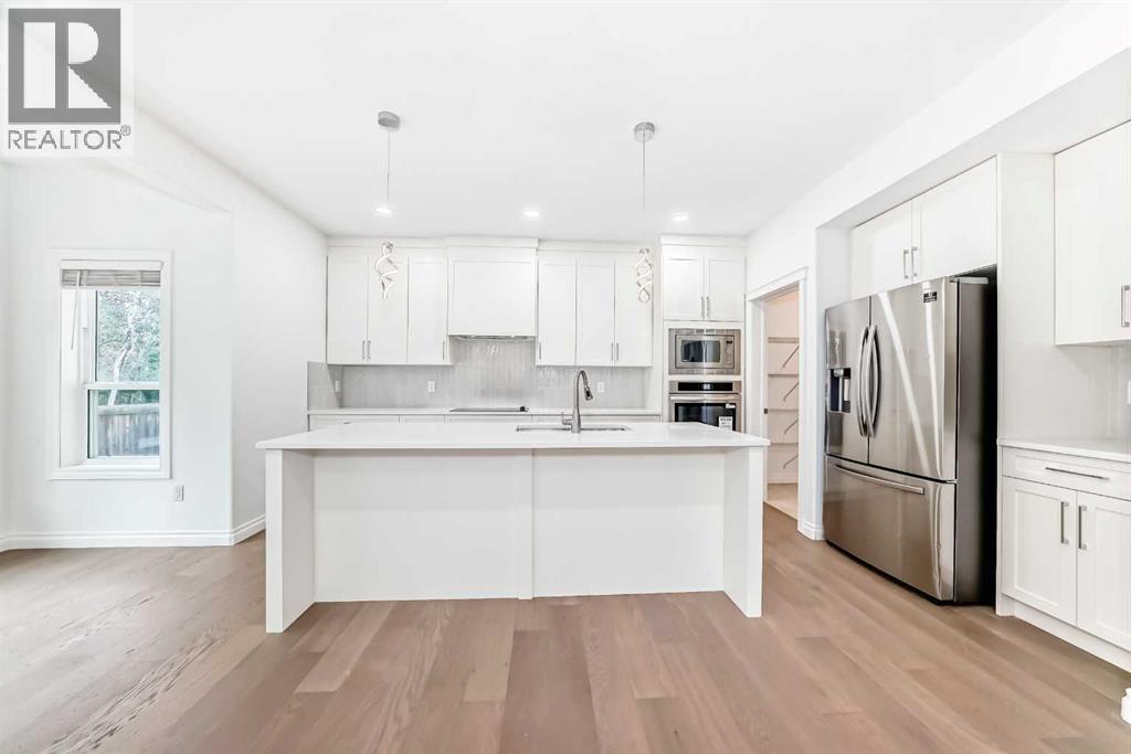 Photo 10 of 18 West Cedar Place Sw, Calgary AB