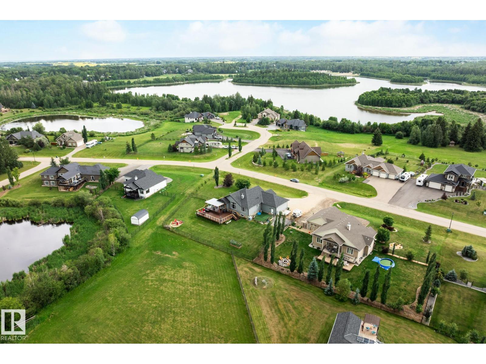 Photo 56 of 2035 Spring Lake Dr, Rural Parkland County AB