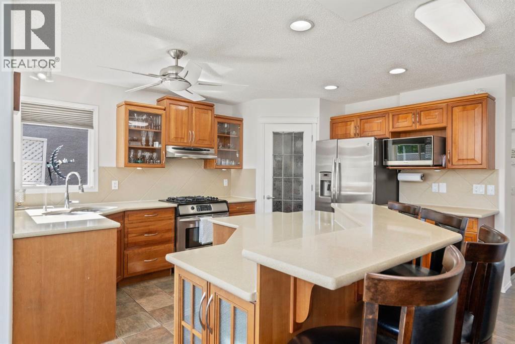 Single Family House for Sale in  Everwillow Close SW Evergreen Calgary 