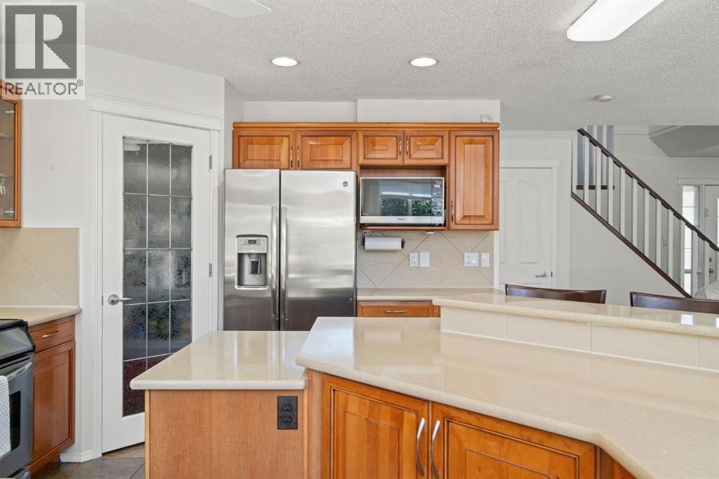 Single Family House for Sale in  Everwillow Close SW Evergreen Calgary 