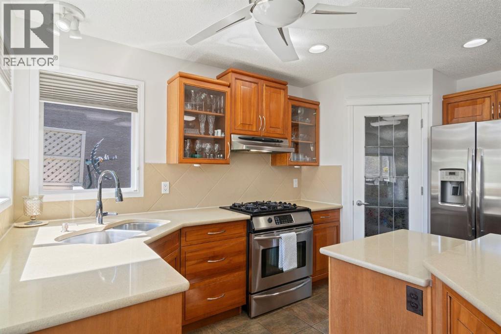 Single Family House for Sale in  Everwillow Close SW Evergreen Calgary 